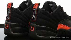 orange jordans foot locker